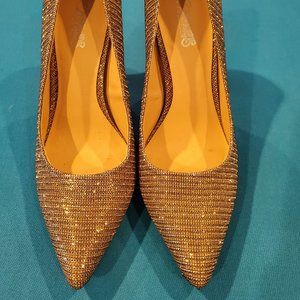 Carlos Santana Metallic Pumps